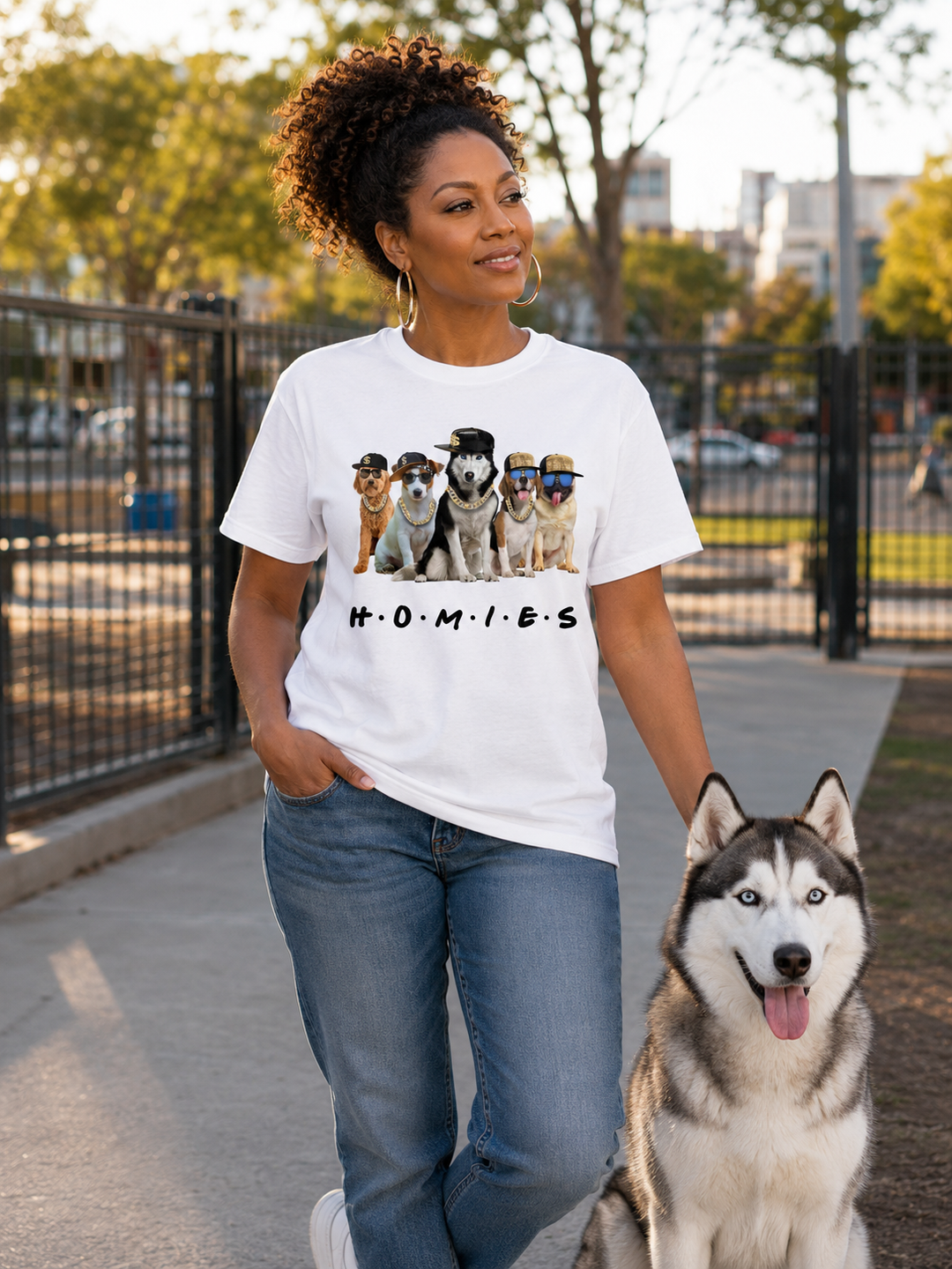 Black woman wearing white Hip Hop HOMIES Husky T-shirt with a Siberian Husky